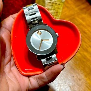 Movado Bold stainless & rose gold. Price is firm with very little wiggle room